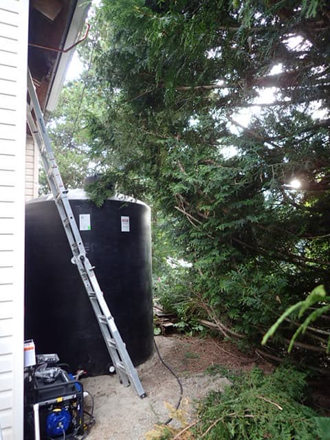 Gutter for snow load, tank and generator for off-grid capability